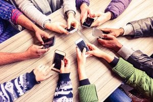 Holding cell phones in a circle