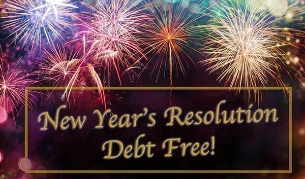 Sign that reads "New Year's Resolution Debt Free!" surrounded by fireworks