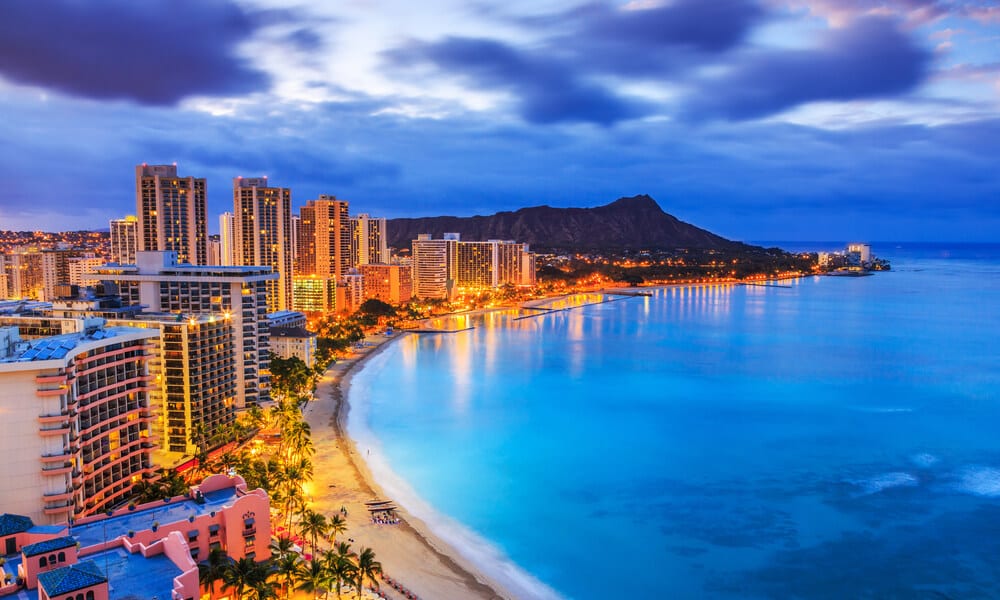 Skyline of Honolulu, Diamond Head volcano including the hotels and buildings on Waikiki Beach.