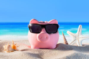 Piggy bank on the beach