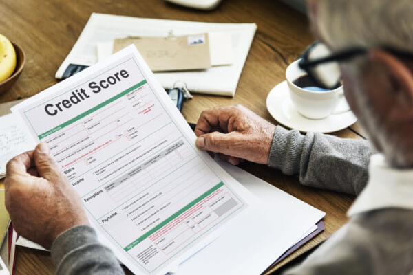 Borrower seeing debt settlement listed on his credit report