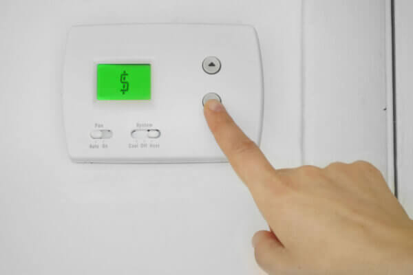 Lowering the air conditioning thermostat