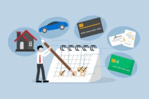 Businessman marking check sign on calendar for monthly expenses