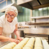 Senior woman working at a bakery